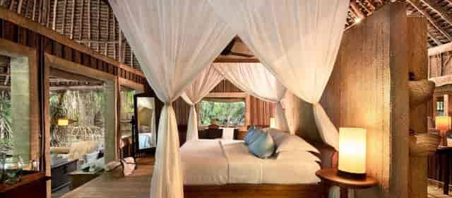 Luxury eco-chic suite at Mnemba Island for exclusive incentive travel and executive retreats.