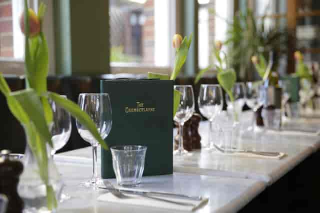 The Chamberlayne dining room with marble tables for business lunches and networking dinners.