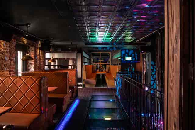 Fibre Middle Floor breakout space with plush booth seating for corporate networking receptions.