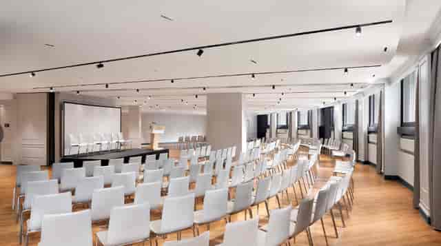 Faggio C Room conference hall in theatre setup for corporate seminars and professional events.