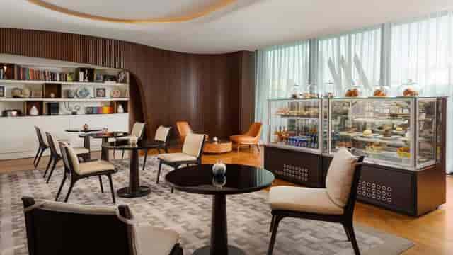Tagiyev Ballroom with cafe seating for corporate meetings and event catering at Baku Marriott Hotel.