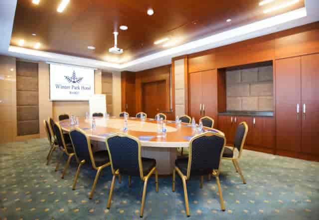 Modern Baku hotel boardroom with AV tech for corporate meetings and business conferences.