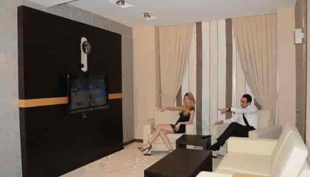 VIP breakout suite at Iron Hotel conference hall for executive meetings and corporate networking.