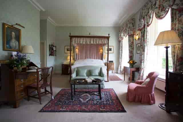 Luxury Pineapple Room suite at Middlethorpe Hall for VIP speakers and board meetings.