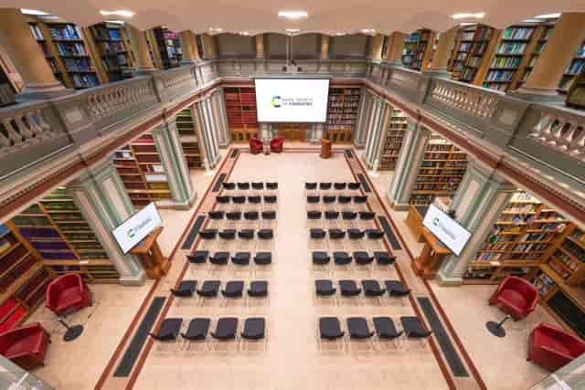 Tiered lecture theatre in historic Royal Society of Chemistry library for elegant corporate events.