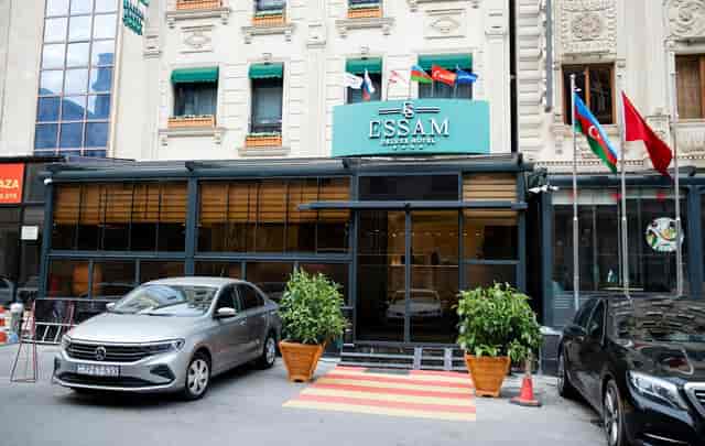 Essam Deluxe Hotel restaurant facade: modern glass venue for boutique events and corporate meetings.