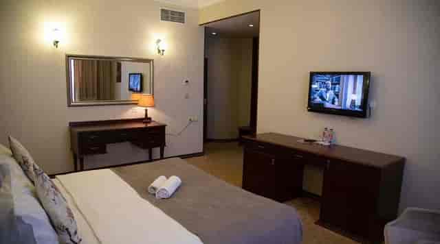 Capitol Hotel suite featuring a functional workspace for business travel and corporate stays.