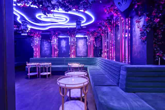VIP lounge at Helios Selene London with plush banquette seating for exclusive after-party events.