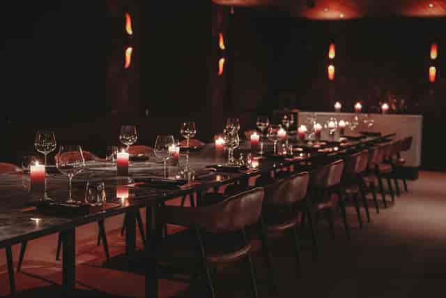 Etna in Hora: Luxury candle-lit private dining setup for VIP dinners and networking events.