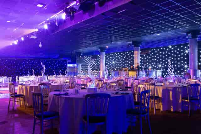 Butlin’s Skegness Centre Stage gala setup with starcloth and uplighting for corporate events.