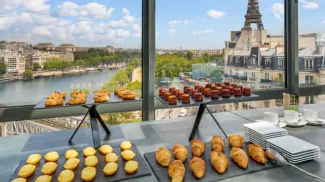 Le Toit meeting room breakfast station featuring elevated platters for corporate events.