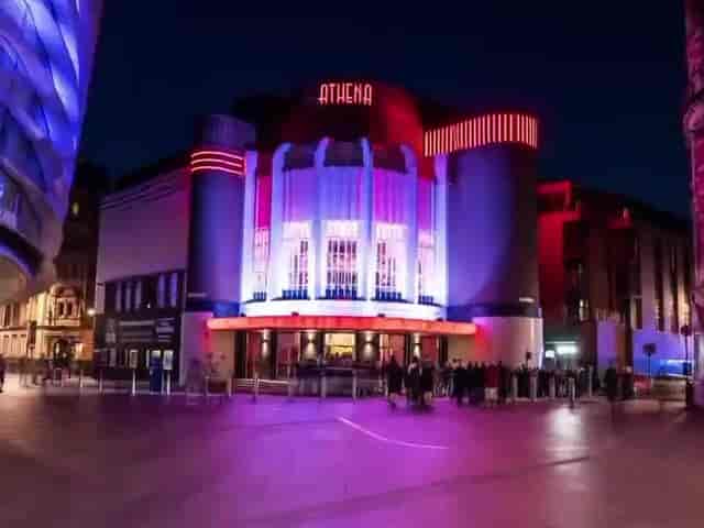 Athena Space venue at night, art deco style, ideal for events and gatherings.