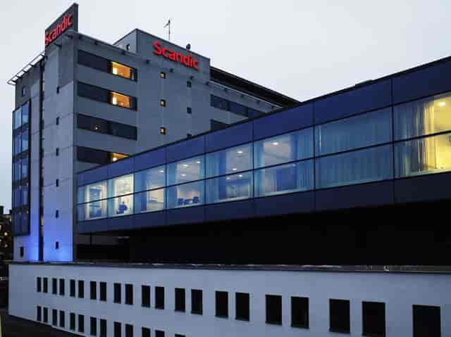 Modern Scandic Alvik glass-fronted building, ideal for corporate meetings and business events.
