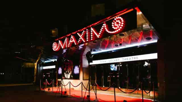 Theater in Maxim Stockholm red-carpet load-in with marquee branding for evening event activations.