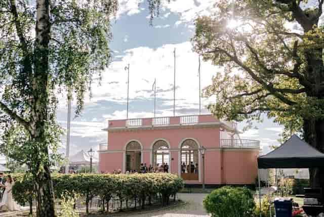 Pink pavilion in Kungliga Borgen courtyard, ideal for wedding or garden reception venue.