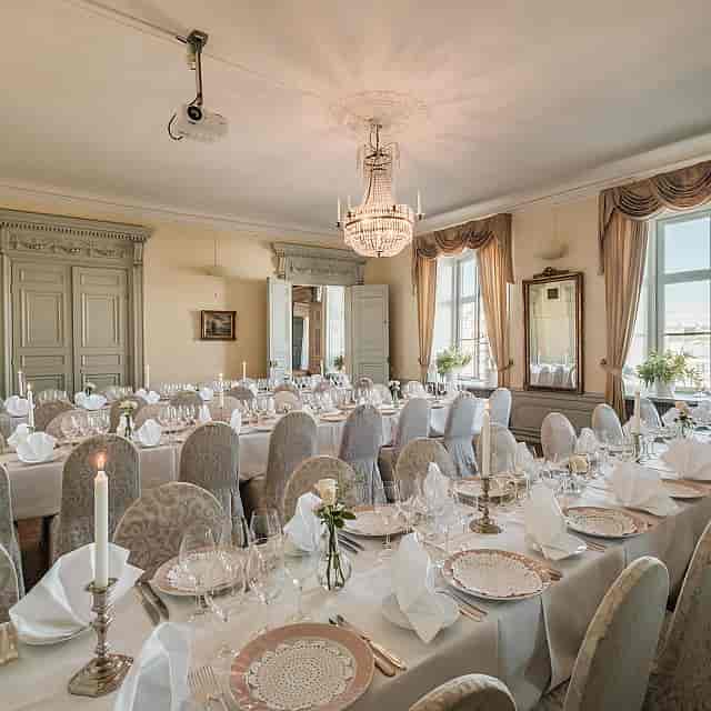 Classic gala dinner banquet setup at Van der Nootska Palatset with elegant architecture.
