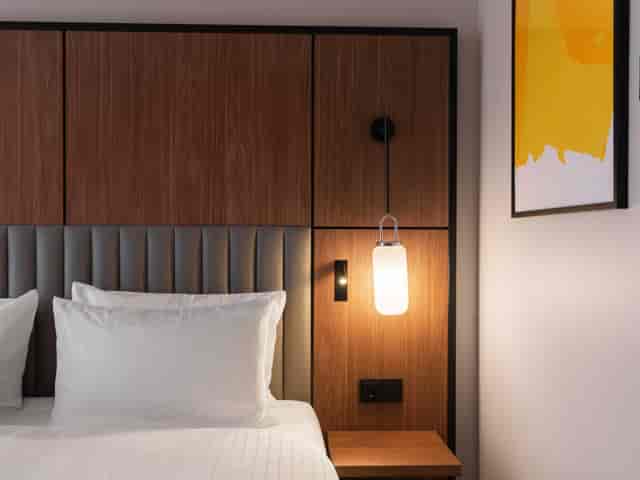 Modern upscale hotel room at voco Stockholm Kista, ideal for executive traveler room blocks.