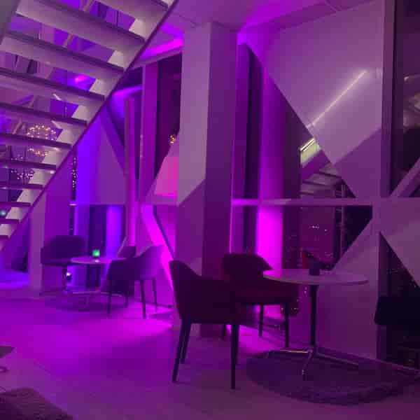Modern VIP networking bar at Scandic Victoria Tower with dramatic LED lighting for cocktail events.