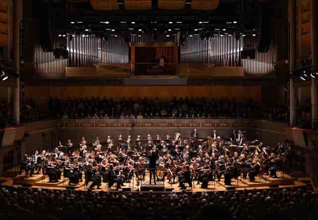Orchestra performing at Stora Foajéen, Konserthuset, featuring tiered seating for events.