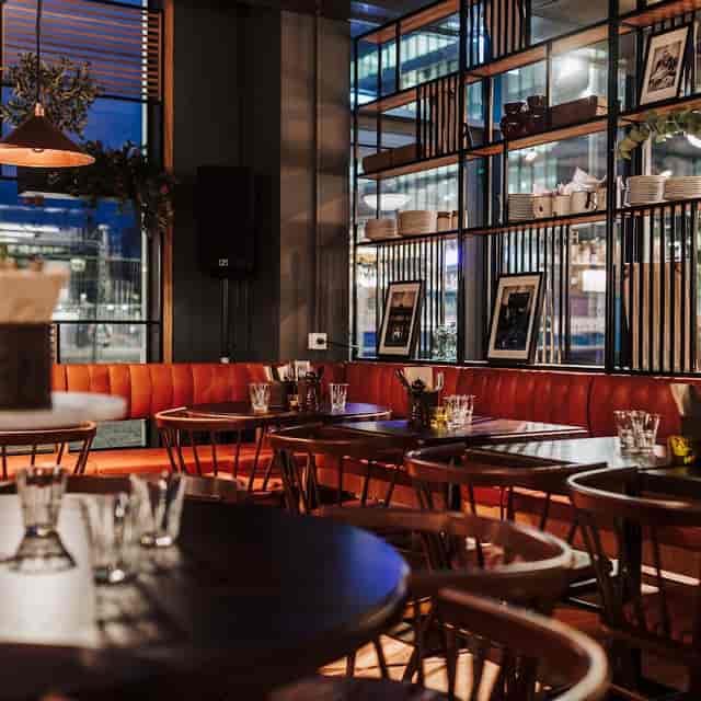 Haga Bottega restaurant booth seating for corporate networking events and professional dinners.