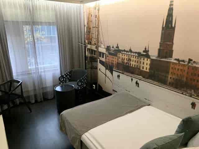 Compact hotel room C7 Stockholm with workspace for business travel events and lodging.