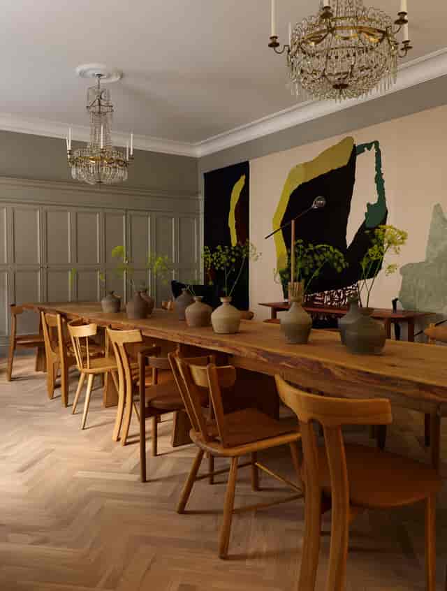 Ett Hem Stockholm: Natural wood table set for executive board meetings and private dining.