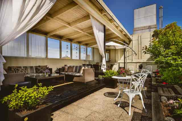 Rooftop terrace at Hotel Lilla Rådmannen with lounge seating for networking and cocktail events.