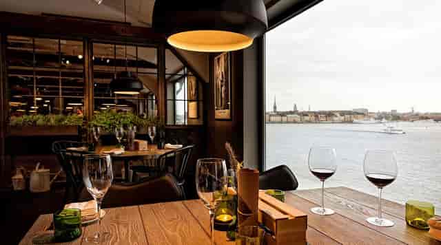 Fotografiska restaurant with waterfront views, perfect for intimate corporate dinners or mixers.
