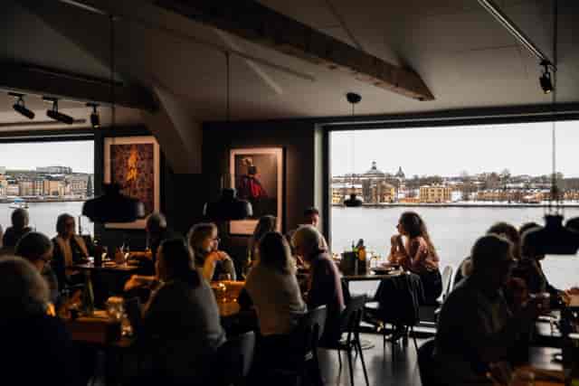 Café at Fotografiska: Waterfront corporate dining venue for upscale networking events.