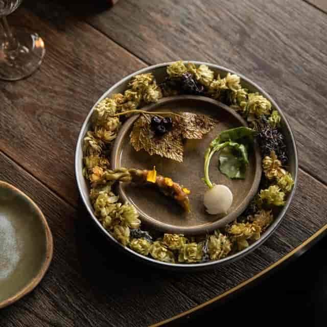High-end plated course at Fotografiska cafe for VIP incentive dinner and farm-to-table event.