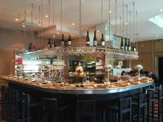High-end Matbaren restaurant with curved bar, ideal for VIP dinners and networking events.