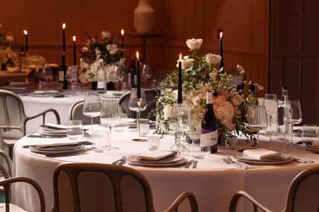 Elegant dining table with floral centerpieces for upscale events at art'otel London.