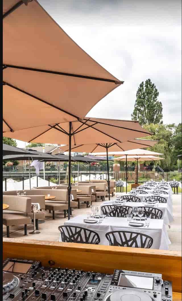 Terrace at Apollo Hotel Amsterdam, stylish seating for outdoor events and celebrations.