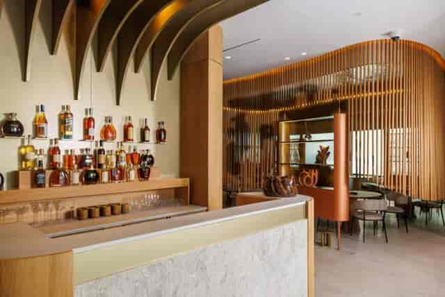 Upscale VIP reception lounge at Bistrot in Orma Roma featuring sophisticated, intimate decor.