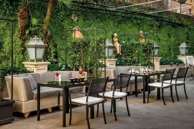 Salone Eva outdoor patio with lounge seating for corporate receptions and networking events.