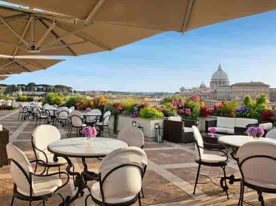 Rooftop venue in Rome with St. Peter's Basilica view for VIP incentive and networking events.