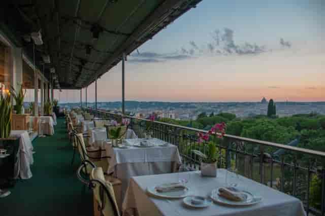 Luxury rooftop terrace in Rome for VIP gala dinner and corporate event.