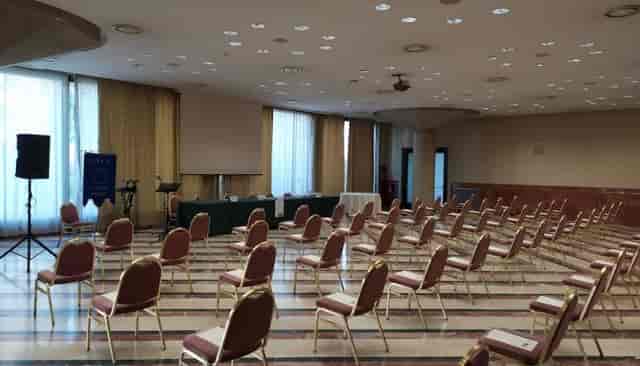 Theater-style conference room at Centro Congressi Cavour for business meetings and corporate events.