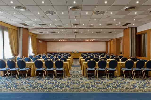 Classroom-style meeting room at Centro Congressi Cavour for training seminars and corporate events.