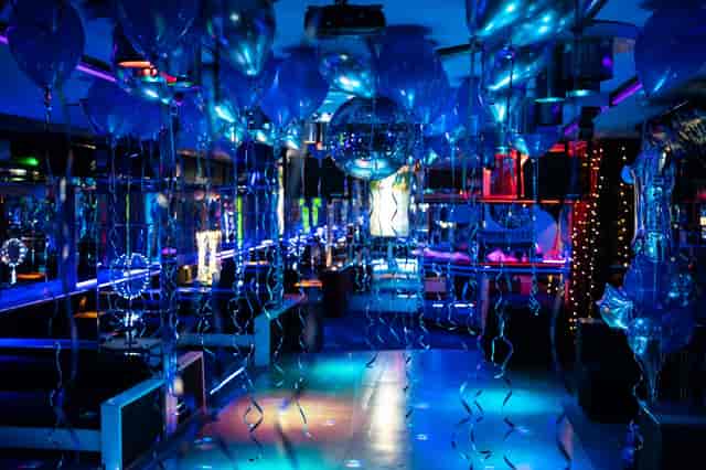Rock music club with blue uplighting, perfect for social gala or brand experiential event.