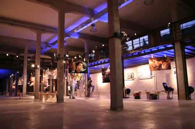 Ex-Factory loft gallery at Officine Farneto with industrial lighting for corporate event venues.