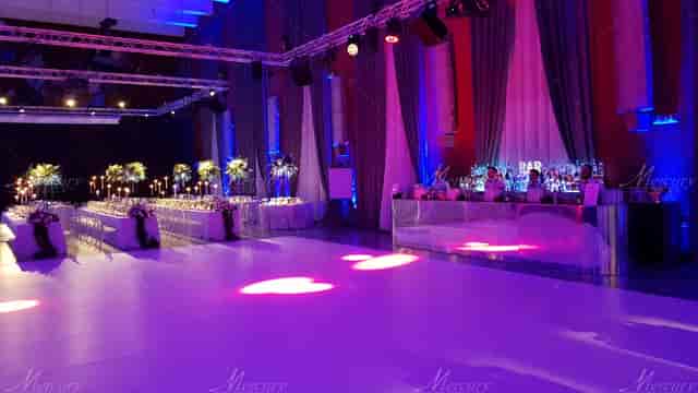 Gala setup in Salone delle Fontane with mirror bar and AV lighting for corporate events.