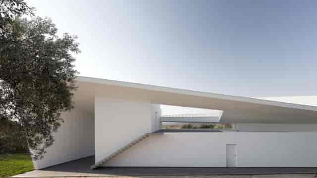 Minimalist MAXXI museum hall for exclusive corporate retreats and architectural product launches.