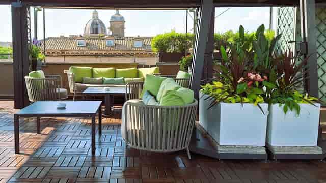 Rooftop boardroom at Hotel Indigo Rome with city views for VIP networking and upscale events.