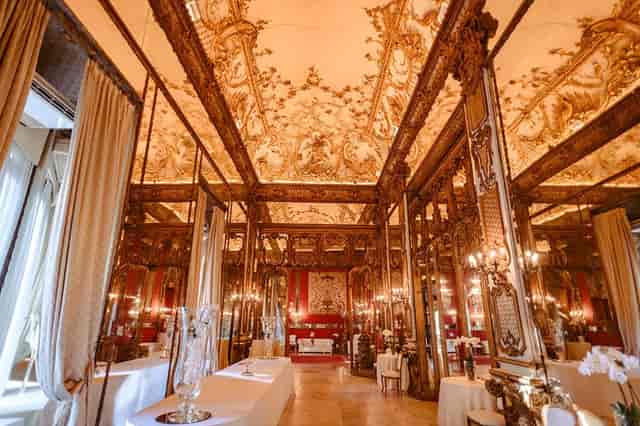 Salone degli Specchi at Castello di Decima: ornate mirrored hall for luxury events and gala venues.