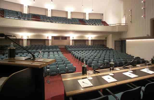 Tiered auditorium at Centro Congressi Frentani set for a keynote panel and conference event.