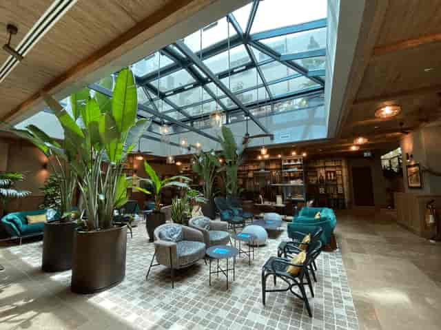 Modern hotel business center with atrium light for corporate meetings and networking events.