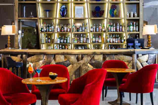 Elegant piano bar at Grand Hotel Palatino for VIP receptions and networking events.