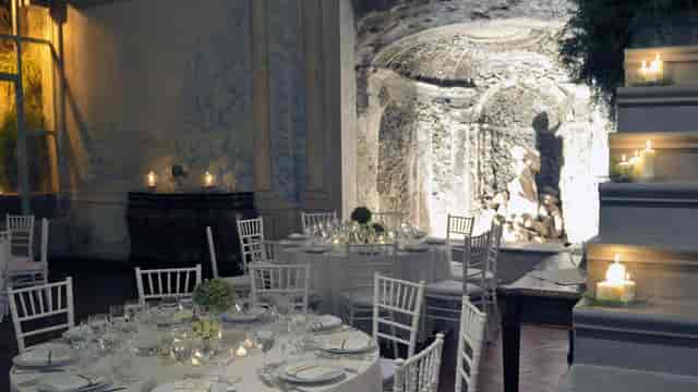 Nympheum hall at Villa Sospisio with stone architecture for an upscale gala or private event.