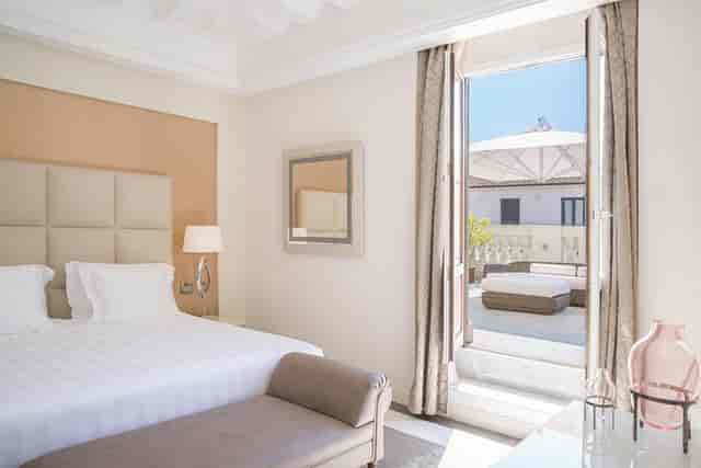 VIP suite at Aleph Rome Hotel with private terrace for executive events and corporate meetings.